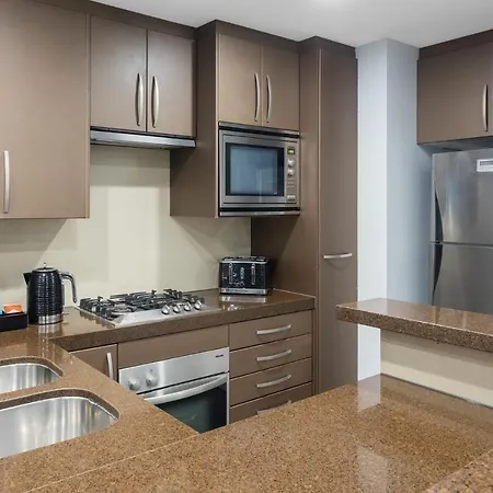 Meriton Suites World Tower, Sydney Exterior photo A typical kitchen in a serviced apartment